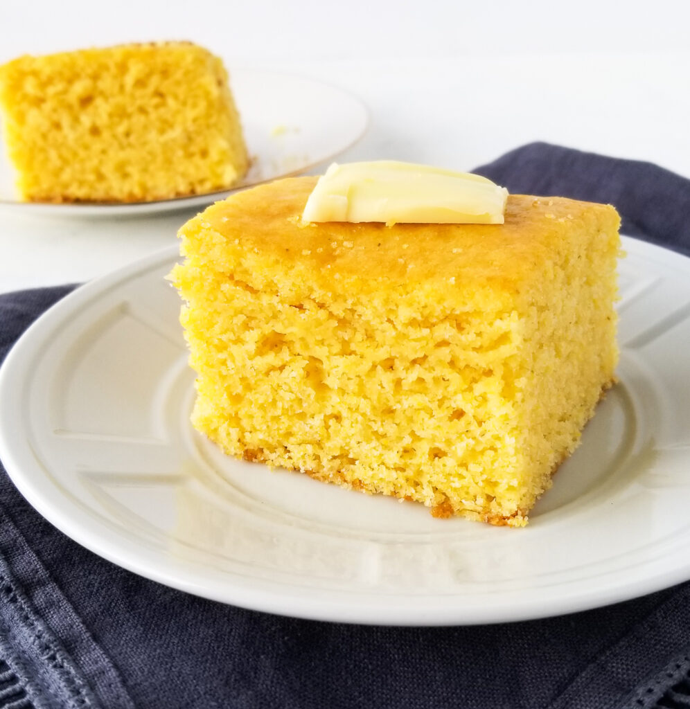 cornbread on plate with butter