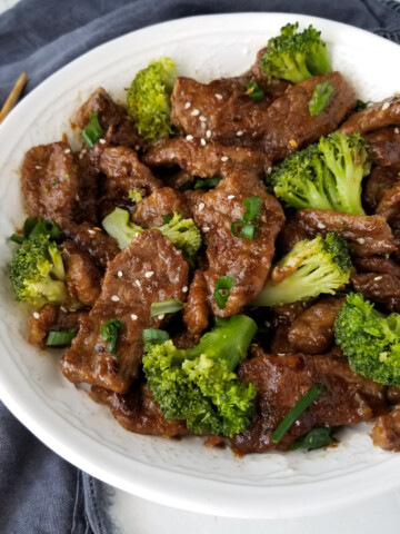 broccoli beef in white bowl