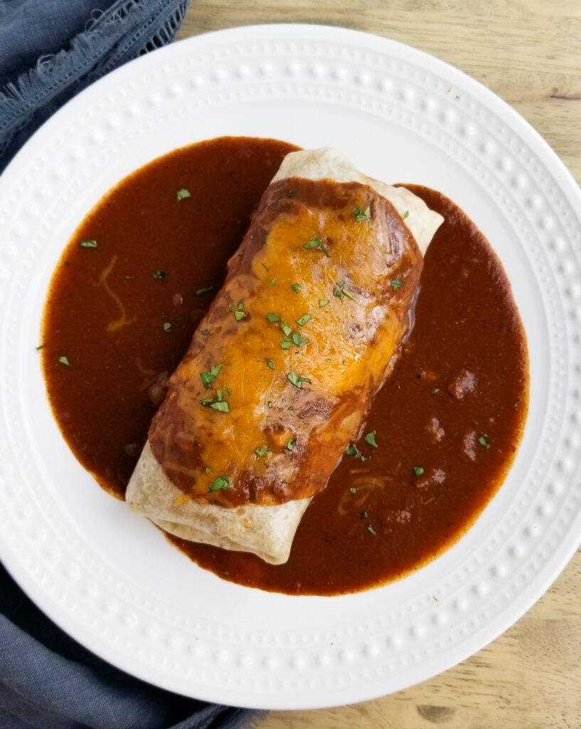 Chile colorado burrito on plate