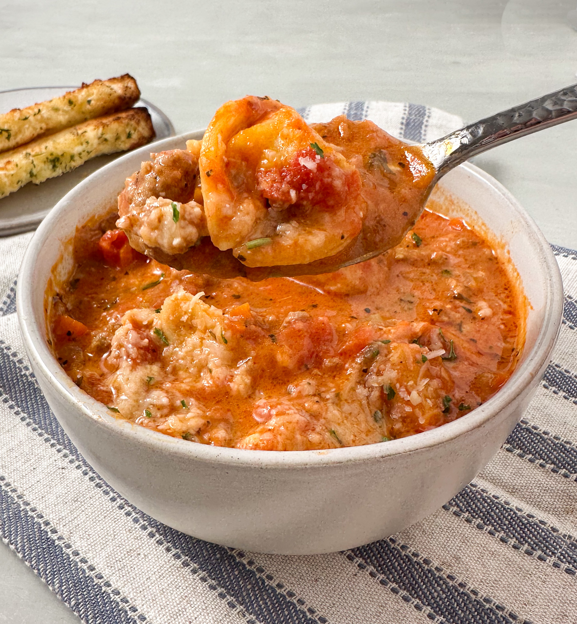 creamy tomato sausage tortellini soup